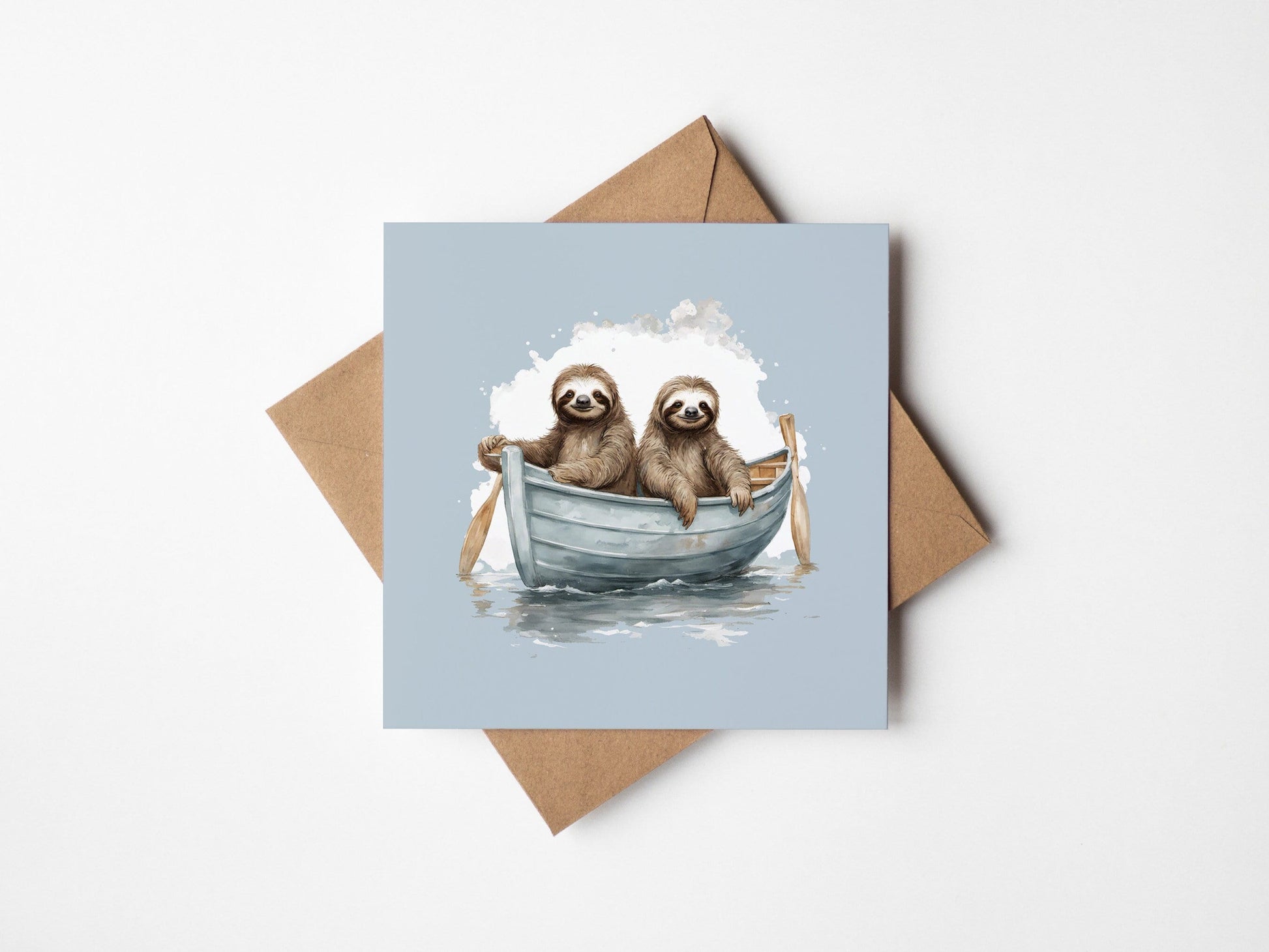 Square greetings card with sloths on the front