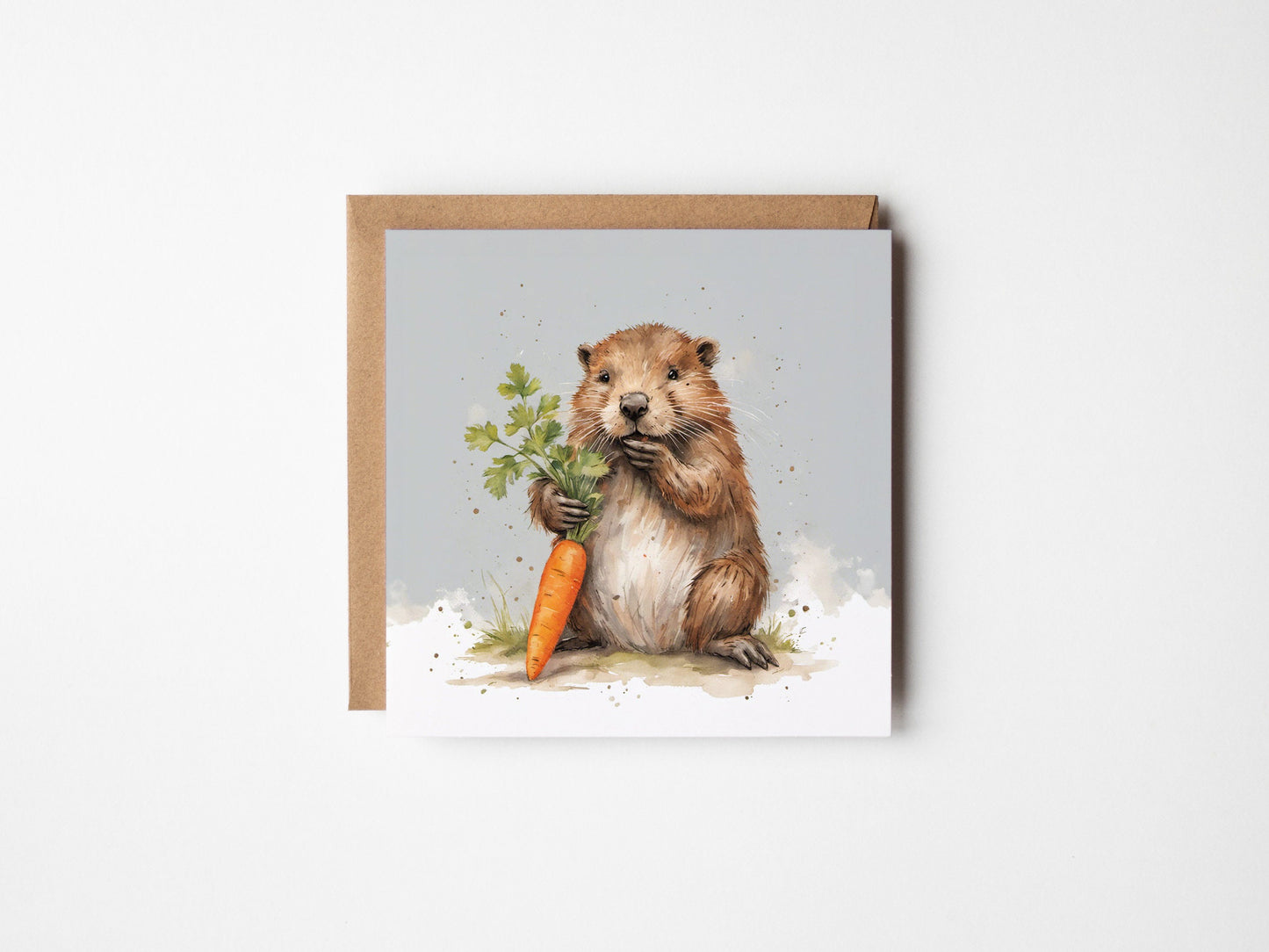 Beaver eating a carrot on a square greetings card