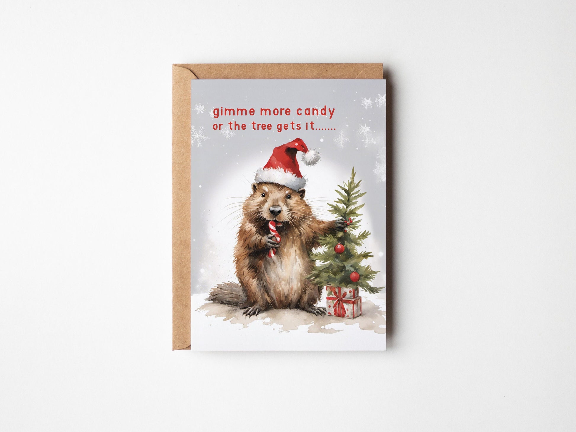 Cute Beaver on a Christmas card with Santa hat wishing you a Merry Christmas